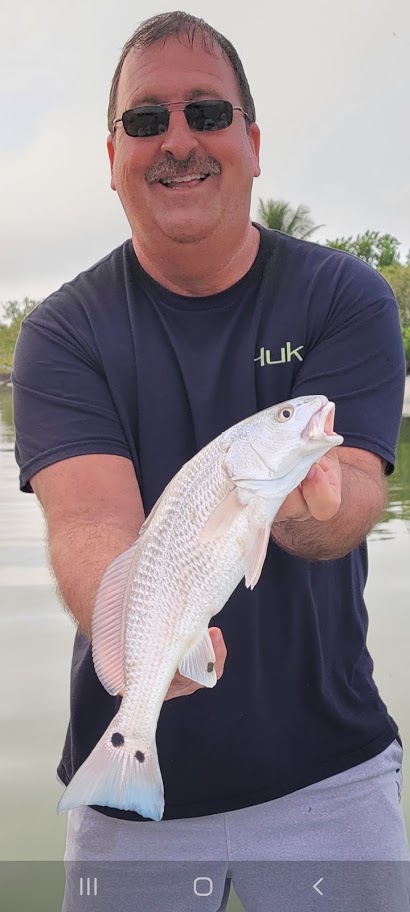 Dad getting the big family fishing fun started