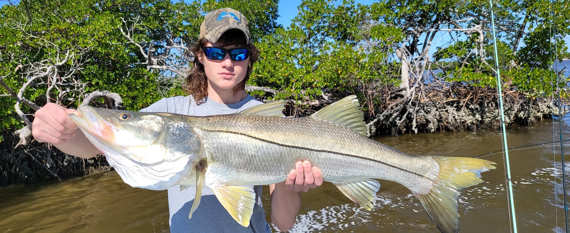Cold Windy Weather Fishing, First Big Snook - Naples Fishing Guide